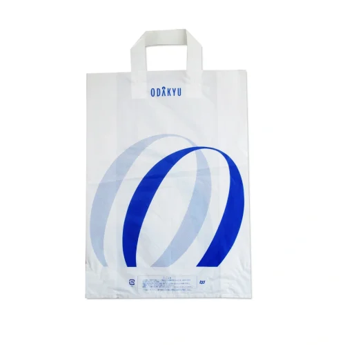 Custom white soft loop handle bag with premium blue branding for fashion retail.